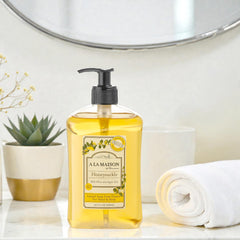 A LA MAISON foam texture on hands showing creamy lather and gentle cleansing