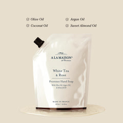 A LA MAISON label close-up highlighting fragrance and botanical benefits