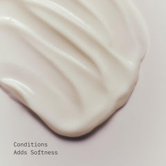 AG Care creamy conditioner texture displaying smooth moisturizing formula