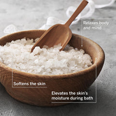 AHAVA pouring salt into bathtub, demonstrates easy use and relaxation benefit