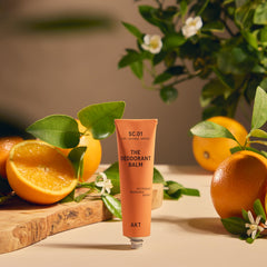 AKT angled tube label highlighting recyclable packaging and vegan formula