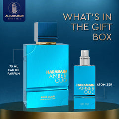 Al Haramain amber oud aqua dubai with refillable atomizer shown for travel convenience
