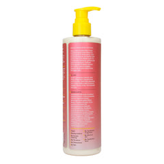 Alaffia 12 fl oz bottle next to hand showing true product scale