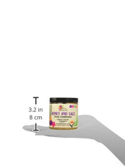 Alikay Naturals being applied to damp hair showing even coverage and improved manageability