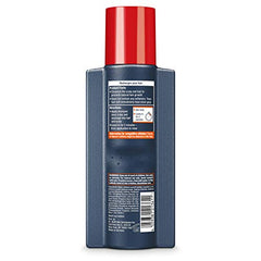 Alpecin C1 bottle next to ruler showing 8.45 oz size and travel convenience