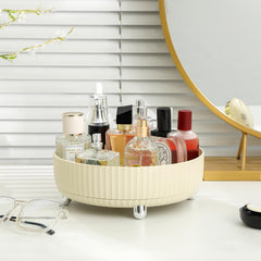Anyoifax tray next to perfume bottle for scale showing compact footprint