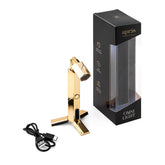 APRÉS Omni Light front view showing compact gold lamp and controls for portable curing