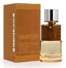 Armaf Hunter bottle on wooden surface conveys warm woody nature and lifestyle appeal