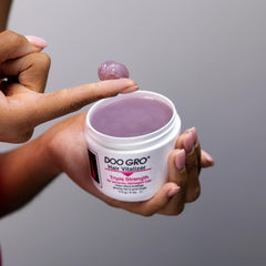 Atlas Doo Gro applied on hands warmed for even distribution and controlled use