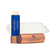 Augustinus Bader lip balm front tube showing sleek design and easy application