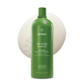 Aveda Be Curly front bottle showing packaging and volume benefits