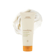 Aveda bottle front view showing branding and size, highlights nourishing formula