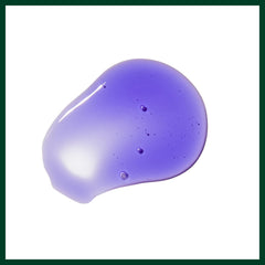 AVEDA blue malva shampoo held in hand showing liter size scale