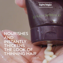 AVEDA pump dispenser detail on conditioner for easy dosing and cleaner use