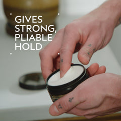 Aveda Men grooming clay texture swatch demonstrating matte, workable paste for styling