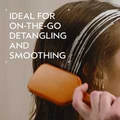 Close-up of Aveda bristles highlighting extended bristle length to gently detangle hair