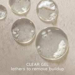 Aveeno shampoo lather texture demonstrating effective buildup removal