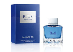 BANDERAS bottle mid-spray demonstrating ease of application and freshness