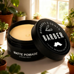 Barbers & Gents pomade warmed in hands demonstrating easy spreadability