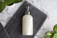 Bastion Finesilk pearlized texture closeup highlighting moisturizing lotion sheen