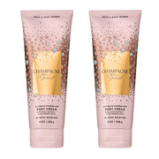 Bath & Body Works front packaging showing two Champagne Toast tubs and celebratory scent benefit
