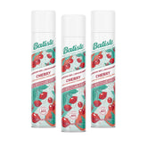 Batiste front packaging showing three cherry dry shampoo cans and fast refresh benefit