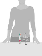 Person using Batiste cherry at roots in a bathroom, brand refreshing hair on the go