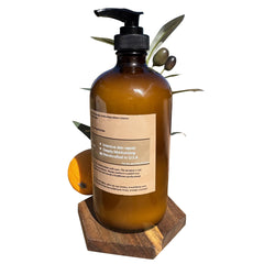 Bear Bird being applied to hand demonstrating quick absorption and hydrated skin