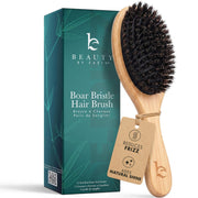 Beauty by Earth brush front view showing clean design and gentle bristles for safer detangling