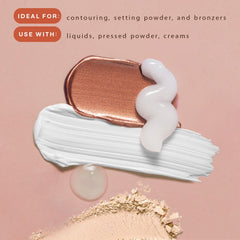 Beauty by Earth kabuki brush applying bronzer for streak-free results