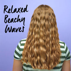 Bed Head Surf’s Up Waver held in hand to show size and travel-friendly portability