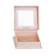 Benefit Cookie highlighter compact front view showing warm golden shade and packaging