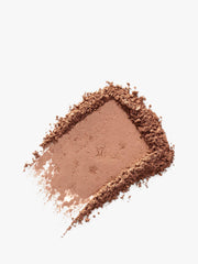 Benefit Hoola mini powder texture close-up showing smooth blendable finish benefit easy blending