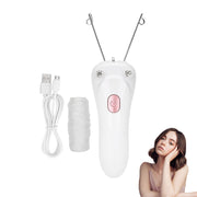 Betued front view of pink threading device showing compact design and easy handling