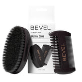 Bevel front view of brush and comb set showing natural materials and compact design