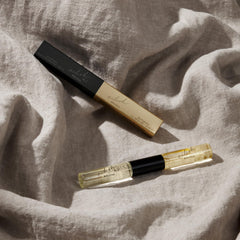 Billie Eilish Amber Gourmand end close-up highlighting label and easy application benefit