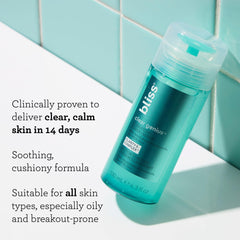 Applying Bliss Clear Genius with cotton pad to unclog pores and tone