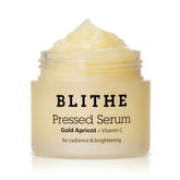 BLITHE pressed serum front compact showing product and glow benefit