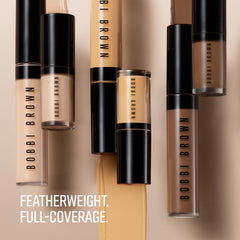 Bobbi Brown concealer applied under eye demonstrating crease-resistant benefit