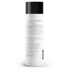 Boldly Basic shampoo texture pouring from bottle highlighting gentle lather benefit