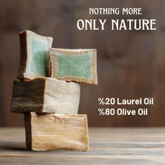 BOX 4 BODY Aleppo soap held in hand demonstrating bar size and easy grip for travel