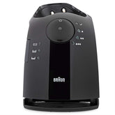 Braun clean & charge base front view showing docking slot and restore function