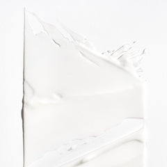 Briogeo conditioner texture closeup showing creamy lightweight formula