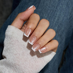 BTArtbox nails in hand showing scale and natural extra-short length