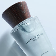 Burberry Touch bottle held in hand demonstrating size convenience