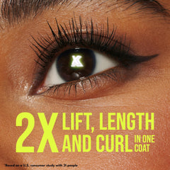 Buxom closeup of brush fibers coating lashes for separation and definition