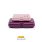 Caboodles front view showing pink and violet cases and compact storage benefit