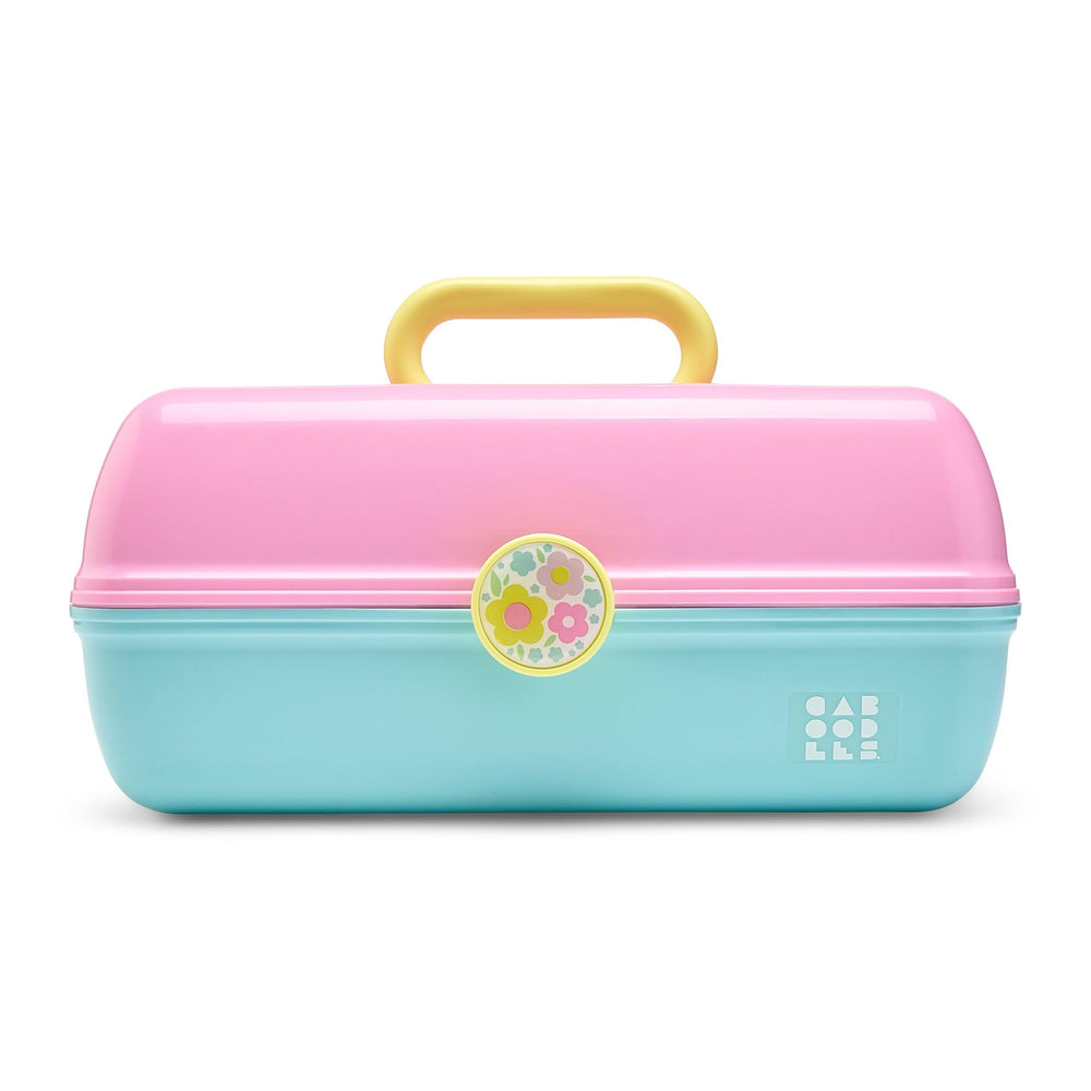 Caboodles front exterior showing two-tone pink and blue and secure latch for travel