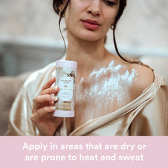 Camille Beckman powder being applied to arm benefit: absorbs moisture and reduces friction