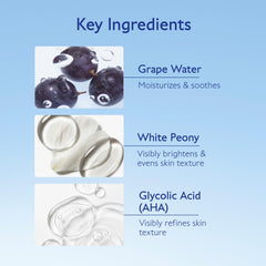 Caudalie pouring essence on hand to show fast-absorbing texture and easy application